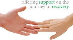 Two hands touching with the words "Offering support on the journey to recovery"