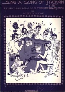 An artistic depiction of Star Trek characters singing and playing the piano, under the heading "Sing a Song of Trekkin'".