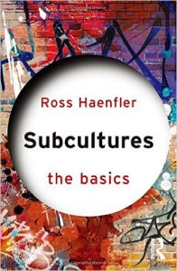 Book cover of Subcultures The Basics by Haenfler. Colorful background with white circle on front page, bolded lettering of title Subcultures The Basics by Ross Haenfler.