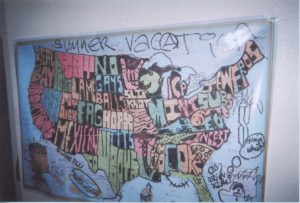 This is an image of a map in a living room an AJJ show was held in. It shows satirical or crude writing for all the states. For example where North Carolina is it just says incest.