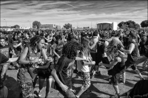 A picture of a group of young men in a mosh pit.