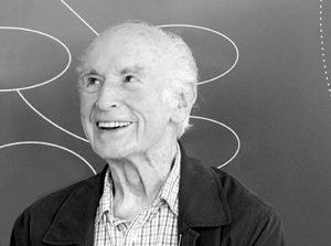 Elderly man smiling and gazing to the left