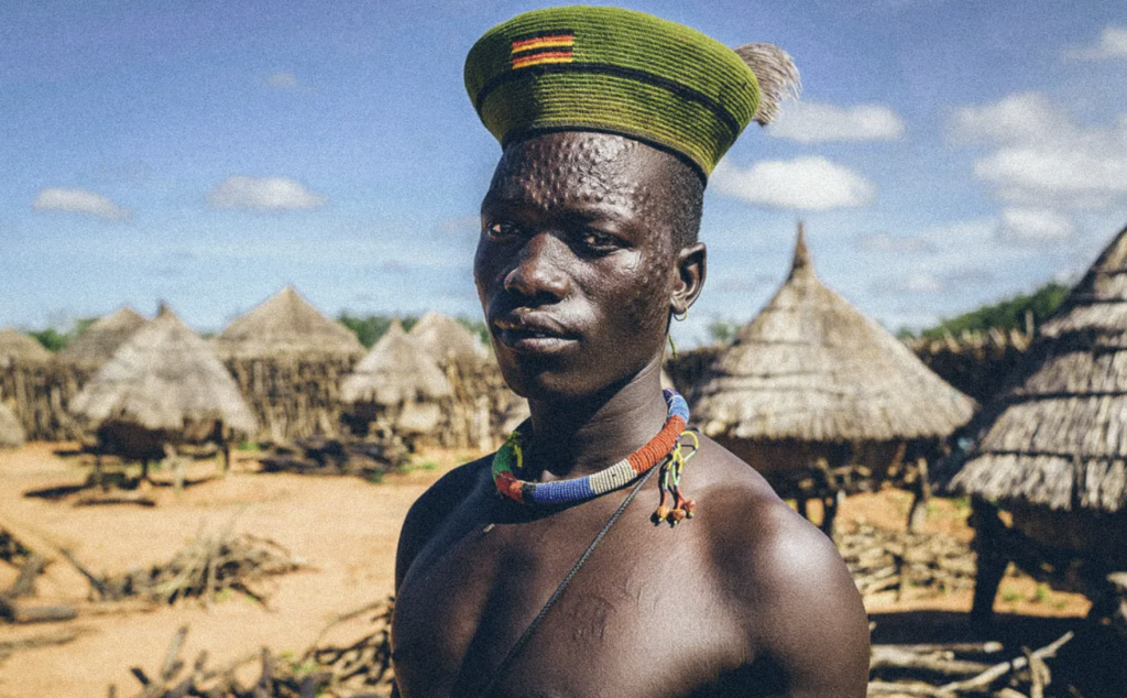 A Karamajong man with scars on his face as a sign of beauty and identity in Northern Uganda